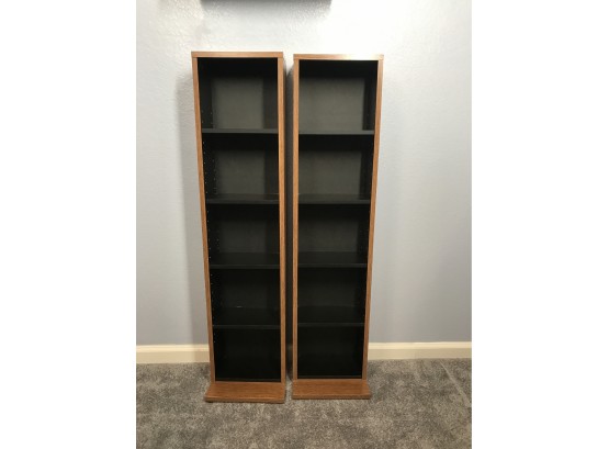 Two Display Towers With Adjustable Shelves