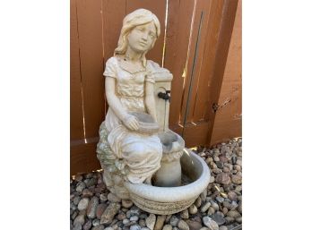 Garden Sculpture Of Girl At Fountain