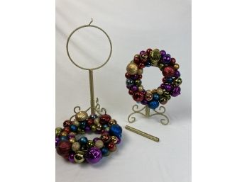 2 Elegant Christmas Ornament Wreaths With Gold Colored Stands