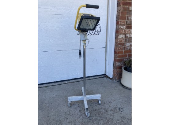 Yellow Work Light On Roller Stand