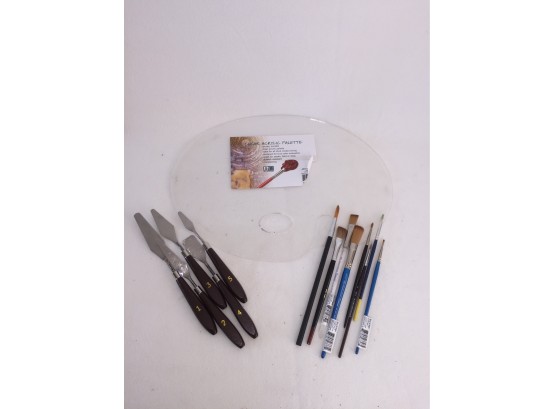 Clear Acrylic Painting Palette With Assortment Of Knives And Brushes