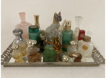 Assortment Of Perfumes On Mirrored Vintage Tray