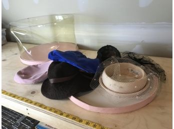 Assortment Of Vintage Hats In Clear Hat Case