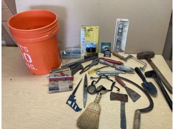 Orange Bucket Full Of Awesome Assortment Of Antique And Vintage Tools Featuring Hatchet Pickax And Goggles