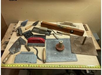 Large Assortment Of Antique Masonry And Finishing Tools Featuring An Antique Wooden Level