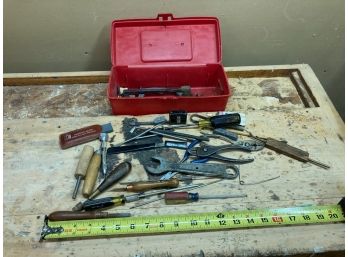 Assortment Of Tools In Red Plastic Toolbox
