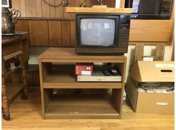 Vintage Analog Television With DVD Player And Wooden Shelf