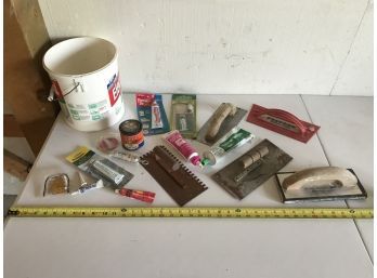 Assortment Of Repair Puddies, Glues. And Trowels