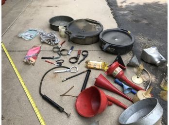 Huge Assortment Of Oil Changing Supplies And Tools With Pans And Filter Wrenches