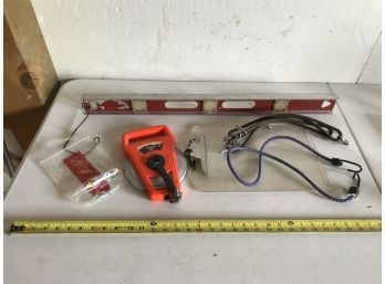 Assortment Of Tools Featuring 100 Foot Tape, Level, Clipboard, Bungees, And Screwdriver Kit