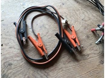 One Heavy Duty Set Of Jumper Cables And One Older Regular Duty Set Of Jumper Cables