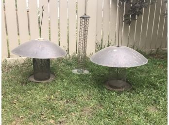 Two Large Bronze Lidded Feeders And One Tall Wire Feeder