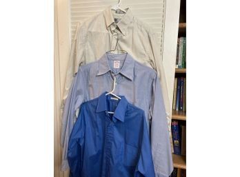 Group Of Various Colored Men's Button Up Shirts