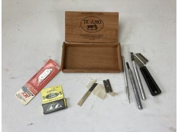 Assortment Of Utility Knives And Blades In Wooden Box