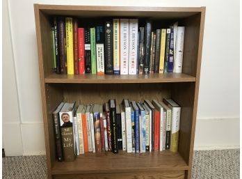 Small Bookshelf With Big Assortment Of Hard Cover And Paperback Books