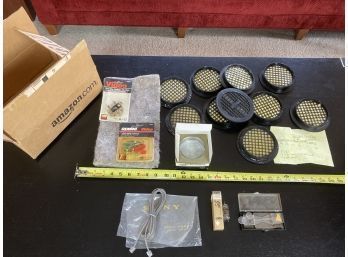 Assortment Of Audio And Video Items Including Vintage Tube And Round Black Speaker Vents