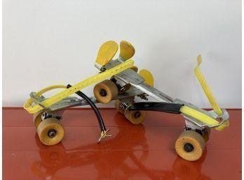 Cute Retro Strap On 'Chicago' Brand Roller Skates With Bright Yellow Straps And Original Tires