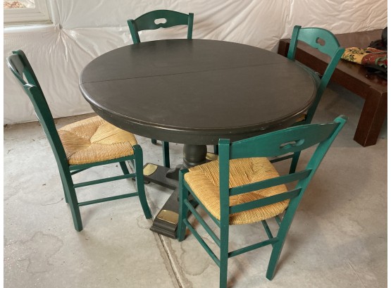 Nice Modern Wooden Table With 4 Green, Wicker Seat Chairs & Leaf Extension, Brass Detail, & Table Cloth