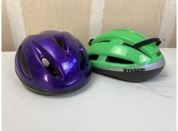 Green Bell Brand Bicycle Helmet And Purple Bicycle Helmet