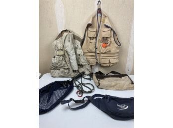 Fishing Lot Including Two Fishing Vest, Fishing Net, And More
