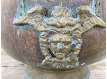 Really Interesting Big Vintage Copper Pot With Embossed Faces And Decorative Ceramic Handles