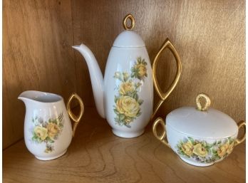 Exceptionally Delicate Gold Gilded Yellow Rose Motif Three Piece Tea Set With Unique Handles