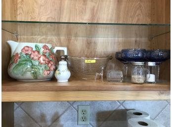Shelf Of Decorative Glassware And Ceramic Featuring Set Of Cut Blue Glass Margarita Glasses