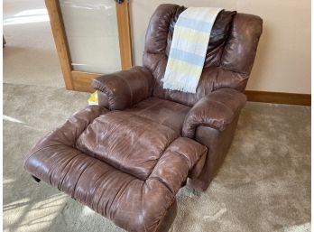 And Leather Recliner With Striped Blanket