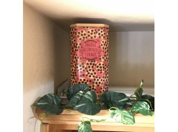 Upper Cabinet Decorations Featuring Decorative Tins And Creamers Cans,Faux Vine, And More