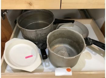 Assortment Of Metal Cooking Pans And Pots