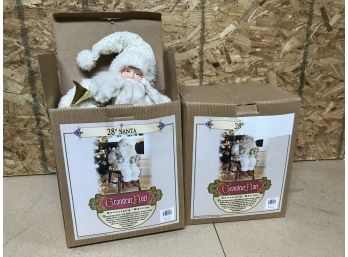 2 Boxes With White Santa Figures