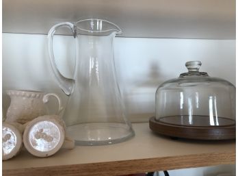 Assorted Decorative Glass And Ceramics Featuring Glass Pitcher And Small Cake Display