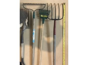 Small Green Rake, Pitchfork, Garden Rake, And Flat Shovel