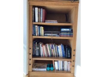 Large Collection Of Books And Two Hand Weights