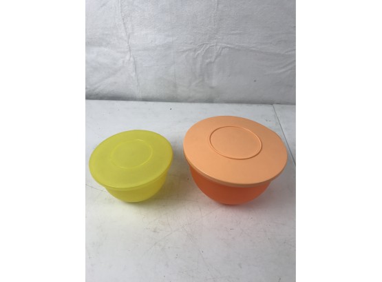 Yellow And Orange Leftover Containers That Come With Lids, Fit Perfectly Into The Other.