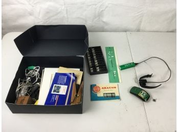Shoe Box Containing Various Office Supplies Including Colorado State Mouse, Fitbit And Vintage Abacus
