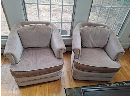 Two Vintage Swivel Armchairs