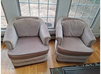 Two Vintage Swivel Armchairs