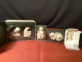 Dept 56-Group Of 4 Snowbabies Including Winter Tales,  Starry Fine Jingle Baby, & New Baby In Stocking