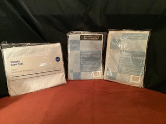 3 Packages Of Twin Vinyl Mattress Protectors