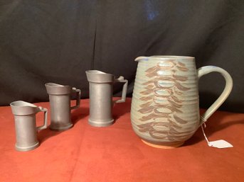 C. Parker Pottery Pitcher& Antique Pewter Measuring Cups