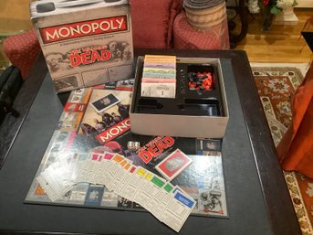 WALKING DEAD MONOPOLY AND DELUXE EDITION OF MONOPOLY