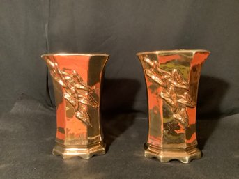 Matching Pair Of Relief Vases