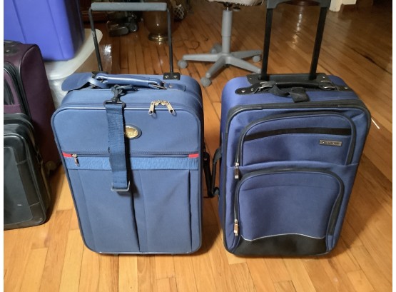2 Carry-on Rolling Suit Cases