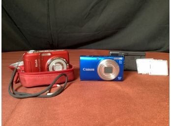Cannon Camera With Battery Charger And Battery Pack & More