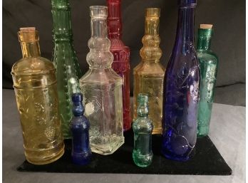 Grouping Of Assorted  Decorative Colored Bottles