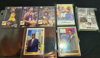 Lot 128: Four NBA Basketball Cards And Three Packs - Mutombo, Bryant