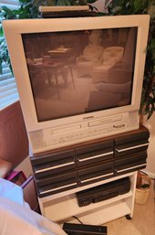 Magnavox 24' TV Built In VCR & DVD Players, Hitachi VHS Player With Entire Video Collection And Stand