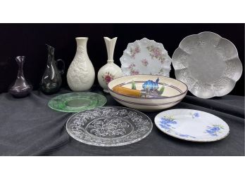 An Assortment Of Decorative Dishes And Vases