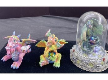 3 Dragon Themed Figurines